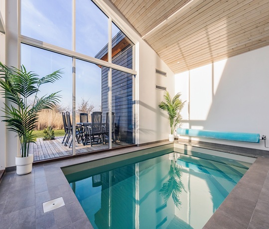 Swimmingpool i sommerhus fra Admiral Strand